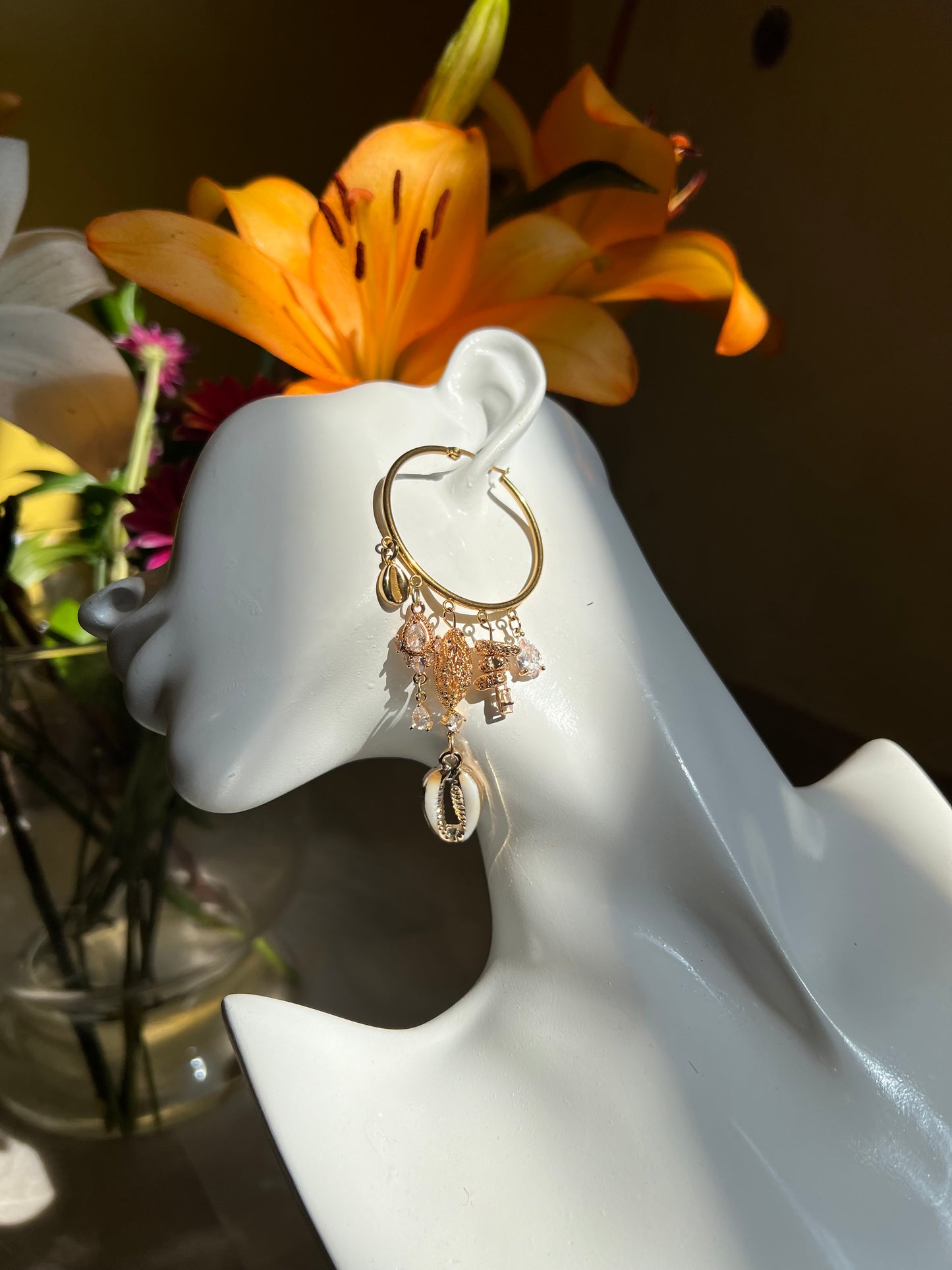 There she glows again earrings